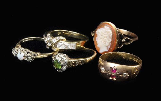 Five Dress Rings: A 9 carat gold cameo ring.