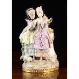 A Meissen Porcelain Figure Group After Acier, depicting two ladies in 18th century attire,