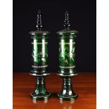 A Pair of Large Emerald Green Glass Lidded Jars.