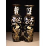 A Pair of Fabulous Black Lacquered Papier Mâché Hall Vases of monumental size having flared necks