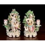 A Pair of Victorian Derby Hancock Porcelain Figural Candle Holders.