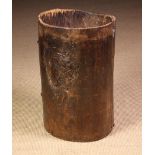 An Antique Rustic Dug-out Treen Bin composed from a hollow tree trunk section with a planked base.