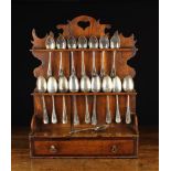 A 18th Century Boarded Oak Spoon Rack of fine colour & patination.