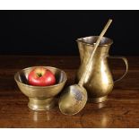 A Late 17th/ Early 18th Century Brass Jug, Bowl & Ladle (A/F).