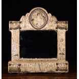 A Charles II Stump Work Strut Mirror.