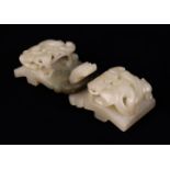 A 19th Century Khotan Jade Belt Buckle carved with Archaistic Dragons, 4½" (11.