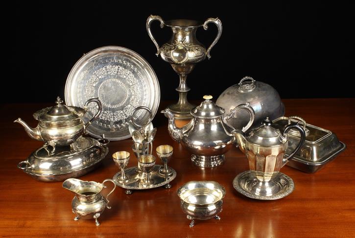 A Group of Plated Wares: A twin handled trophy with engraved decoration.