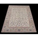 A Fine Persian Tabriz 50 Raj Carpet woven in wool with silk highlights with allover design of