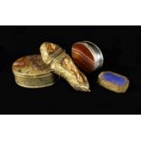 A Group of Four Decorative Containers: A 19th century brass box of oval form with a plume agate lid