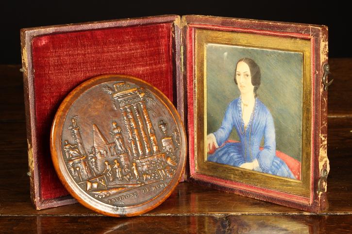 An Early 19th Century French Pressed Burrwood Snuff Box Lid decorated in relief with figures