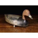 An Early 20th Century English Carved & Painted Wooden Decoy Duck with original pendant lead weight