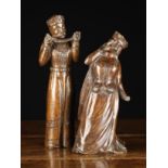 A Pair of 19th Century Oak Figure Carvings: A Medieval king stood holding a strap,