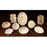 Nine Small Attractive 19th Century Ceramic Culinary Moulds.