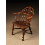 A 19th Century Yew-wood Child's Windsor Armchair, Circa 1840.