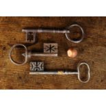 Three Antique Keys: A Large 18th Century Ribbon top Steel Key with an intricately cut bit on a