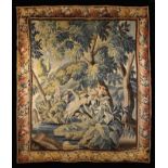 An Early 18th Century Verdure Tapestry Fragment depicting woodland with a stork stood amidst