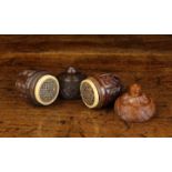 Two Fine Early 19th Century Coquilla Nut Nutmeg Cases with graters carved in the form of