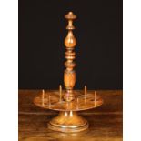 An 18th Century Turned Fruitwood Cotton Reel Stand with elaborately turned centre stem screwing