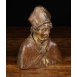 A Small 16th Century Carved Oak Flemish Bust of a Bishop with traces of residual polychrome,