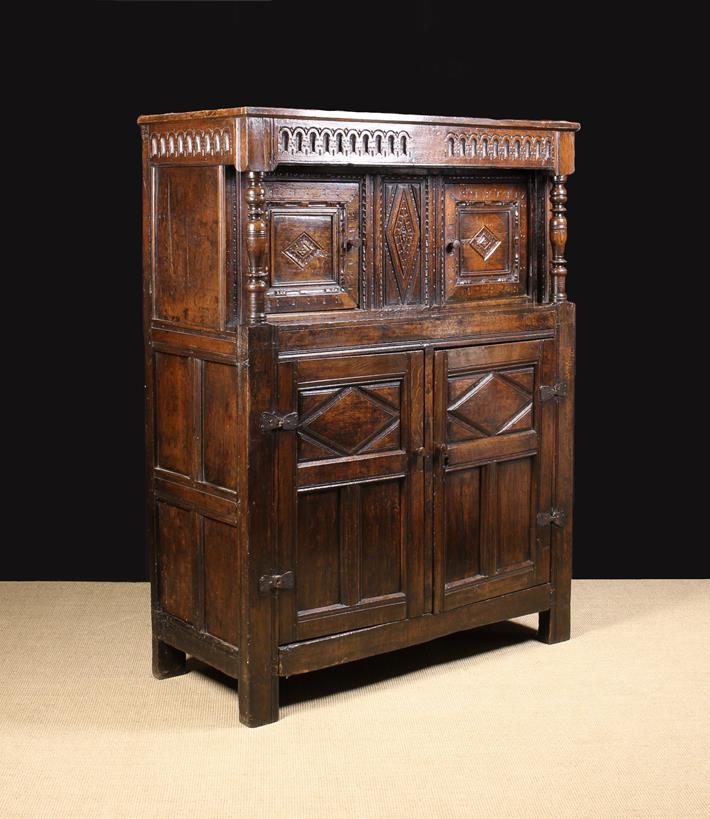 A 17th Century Joined Oak Court Cupboard of good colour & patination.