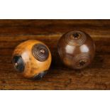 Two Fine 19th Century Puzzle Balls: One of richly patinated box-wood decorated with ebonised ring