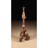 A Baroque Style Pricket Candlestand partially frosted with gilding.