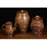 Two 19th Century Treacle Glazed Stoneware Spirit Barrels and a Coffee Pot with applied