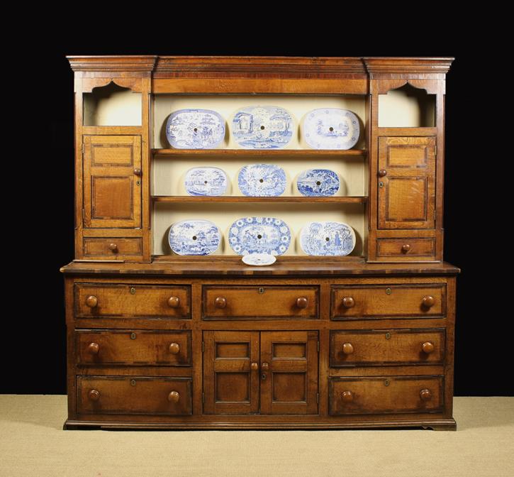 A Good 19th Century Oak Dresser with Rack inlaid with cross-banded borders edged with strings of