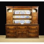 A Good 19th Century Oak Dresser with Rack inlaid with cross-banded borders edged with strings of