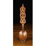 A Fine 19th Century Welsh Love Spoon with an elaborate pierced and carved handles incorporating