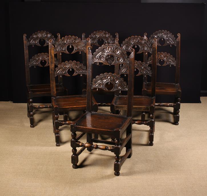 A Set of Six 17th Century Carved Oak Dining Chairs, attributed to Derbyshire or Yorkshire,.