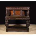 A Fine 16th Century Carved Oak Court Cupboard of Canted Form.