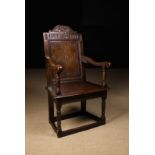 A 17th Century Oak Wainscot Chair.