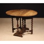 A Charles II Oak Gateleg Table.