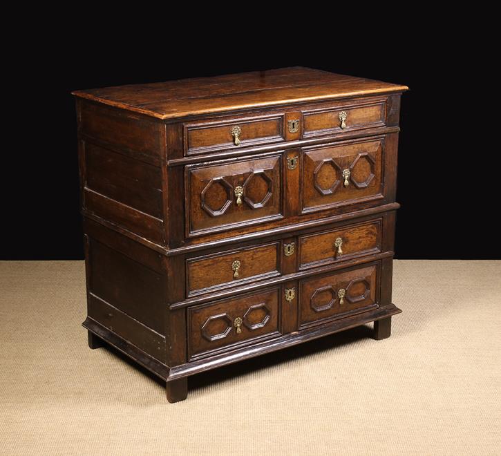 A Large Late 17th Century Oak Chest of Drawers in two sections.