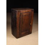 An 18th Century Joined Oak Wall Cupboard.