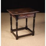 A 17th Century Joined Oak Side Table with compartmented drawer.