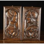 A Pair of Early 17th Century Carved Oak Portrait Panels.