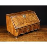 A Fine 18th Century Walnut Table Bureau inlaid with feather-banding and edged in astragal moulding.