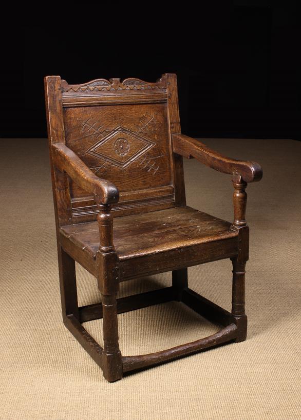 A 17th Century Joined Oak Armchair.