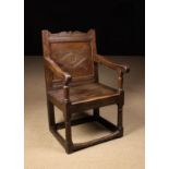 A 17th Century Joined Oak Armchair.