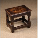 A Small, Low 17th Century Joined Oak Stool in good original condition.