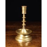 A Heavy Gauge Brass Gothic Style Candlestick.