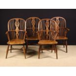 A Set of Four 19th Century Yew-wood Windsor Armchairs attributed to Buckinghamshire,