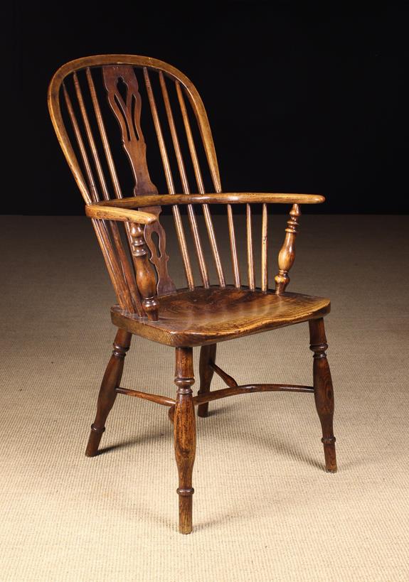 A 19th Century Hoop Back Windsor Armchair.