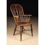 A 19th Century Hoop Back Windsor Armchair.