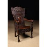 An Antique Oak Wainscot Chair.