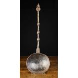 A Fine 17th Century Hand Wrought Iron Ladle decorated with chased square unions,