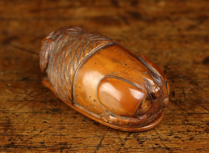 An Early 19th Century Coquilla Nut Snuff Box intricately carved in the form of a recumbent dog with - Image 4 of 4