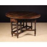 An Early 18th Century Oak Gateleg Table.